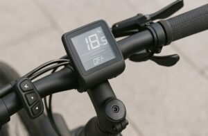 ashboard display of an e-bike showing speed and battery status.